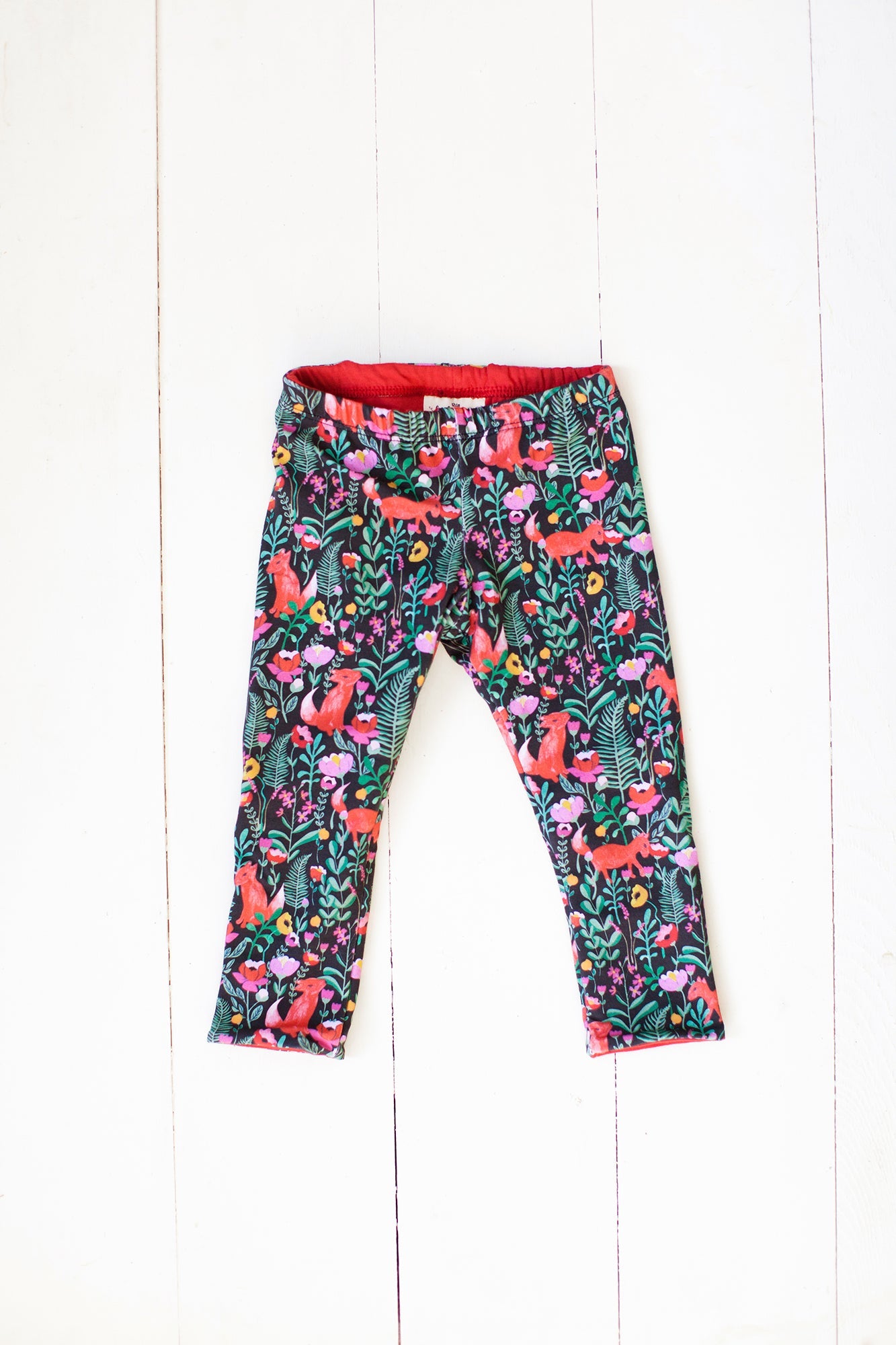 Reversible leggings in fox floral/spicy red